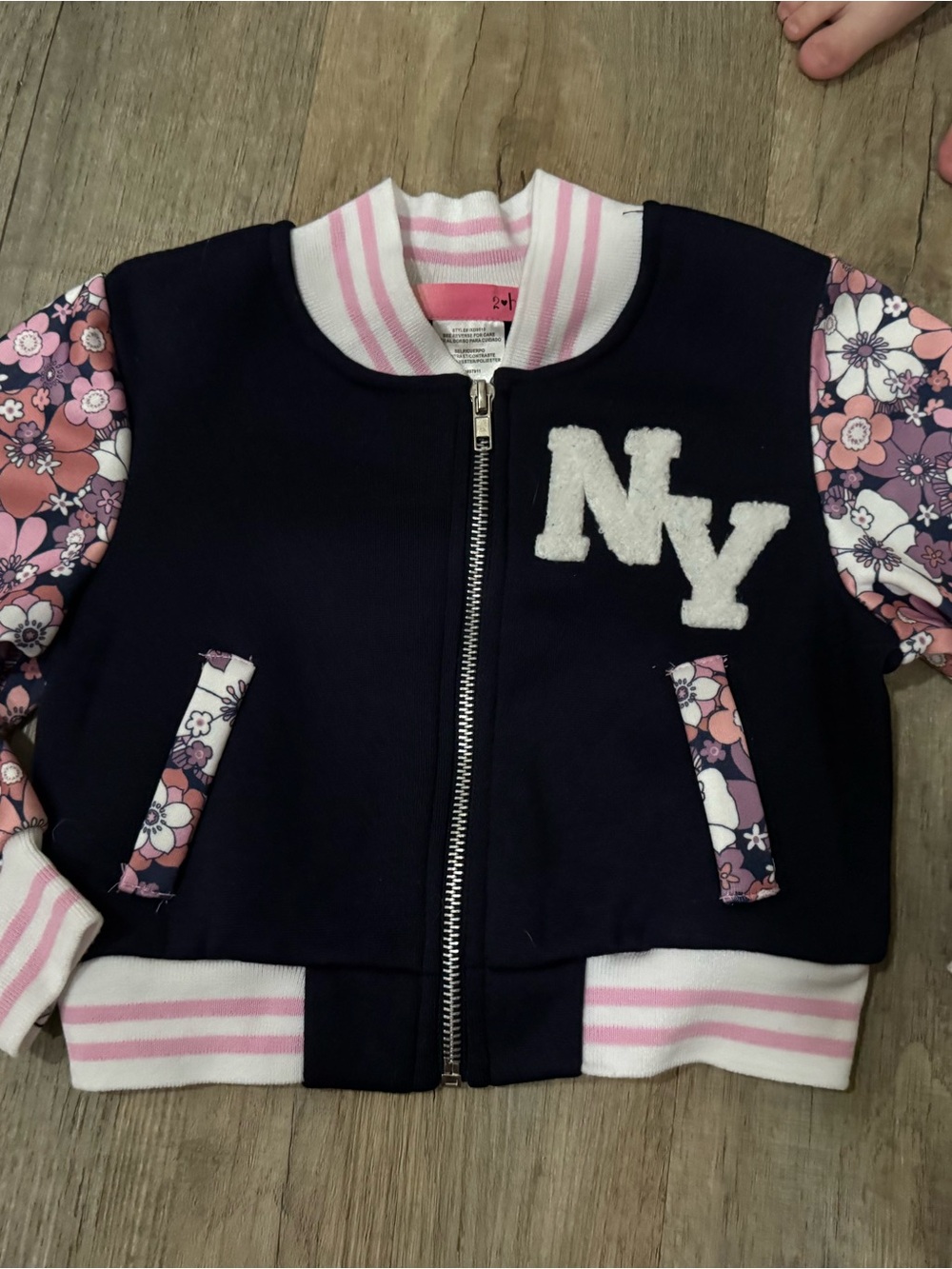 Girls Navy Bomber Jacket with Pink Floral Sleeves